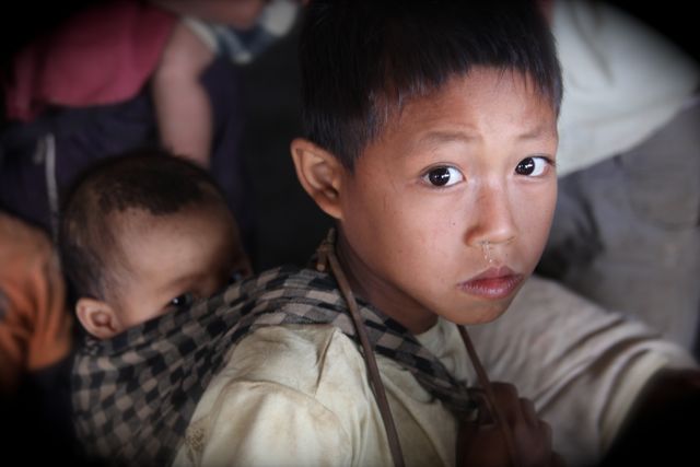 Project Phongsali 2011: Illness hits children especially hard.  With no medicine villagers rely on spirit ceremony alone.