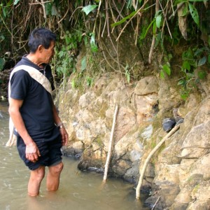 Mr. Magnet set the goal of diverting a stream and thereby bringing water to his new rice field.  He would call upon our team to blow up ordnance that he claimed to have found (conveniently) along the path of the ditch he was digging.